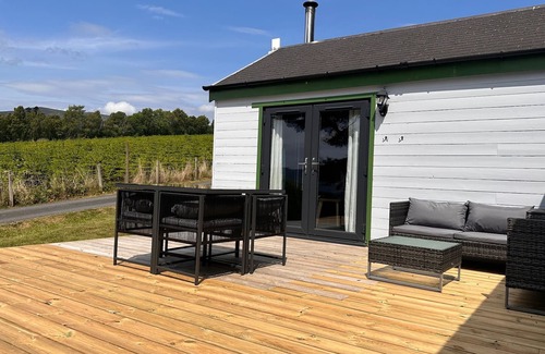Pitlochry Cabin | Spacious Lodge with woodburner, hot tub and beautiful views from the patio deck.