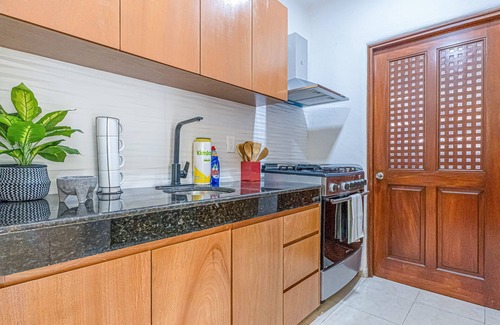 12th Street Apartment | Spacious modern apartment with private balcony, pool access & steps to the beach
