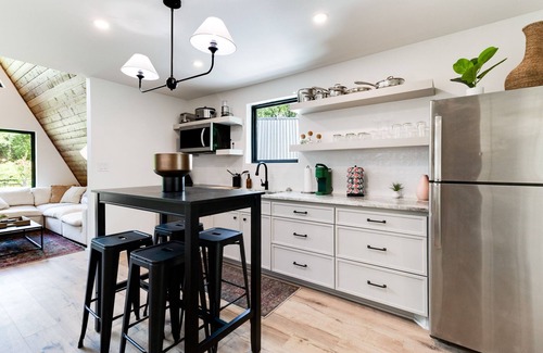 New Iberia Cabin | Spacious & Modern A-Frame w/Hot Tub & Fire Pit near Rip Van Winkle Gardens