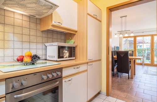 Zingst Apartment | Spacious Möwennest vacation apartment with terrace, garden view and pool in Zingst