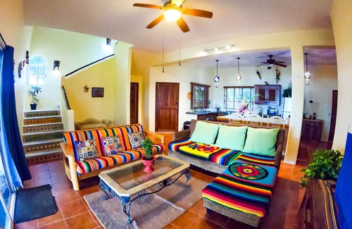 Majahual House | Spacious oceanfront home with palm trees, kayaks and spectacular views!
