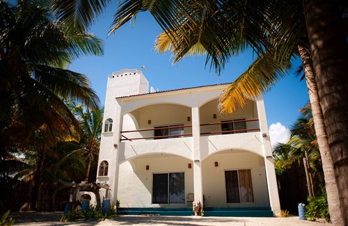 Majahual House | Spacious oceanfront home with palm trees, kayaks and spectacular views!
