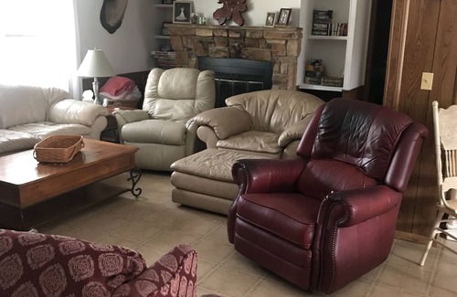 Tow House | Spacious open floor plan with beautiful oak trees.