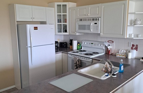 East Kootenay Condo | Spacious pet friendly condo with beautiful golf course and mountain views