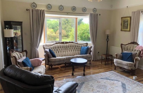 Caragh House | Spacious period style house where old meets new with romantic garden retreat.