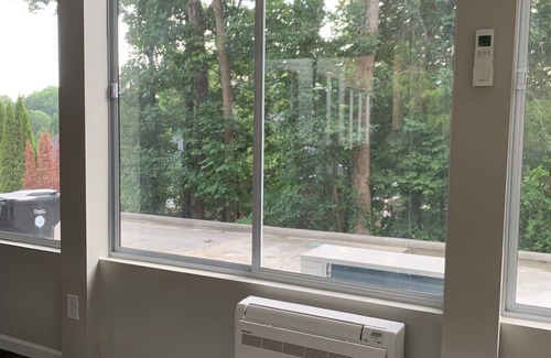 Concord Apartment | Spacious Split-Level, Basement Apt. w/Gorgeous Sunroom Overlooking Wooded Area.