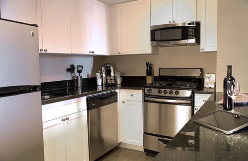Logan Square Hotel | Spacious Suite with Kitchen | City Views | Rooftop Pool | Pet-Friendly
