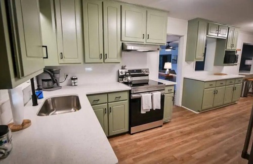 Covington House | Spacious, Town Square, Theatre Room! 4 bed/2 bath Private Home on town square