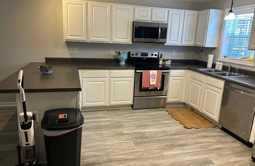 White Lake House | Spacious townhome in private community with community pool and lake access