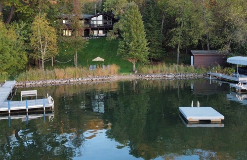 Whitewater House | Spacious, Upscale Whitewater Lake Home |200+ Ft of Lake Frontage |Swim Deck |Docks |Screened Porch