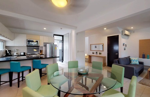 Playa del Carmen Villa | Spacious villa with balcony, patio, strong WiFi, partial AC, pool & gym