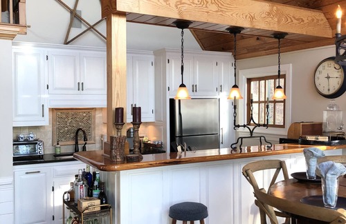 Henrico House | Spectacular main lake views with sandy beach and sunset
