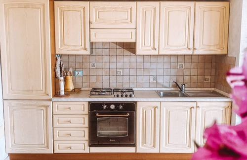 Chia Villa | Spectacular sea view of the entire bay of Su Giudeu. King size bed +topper