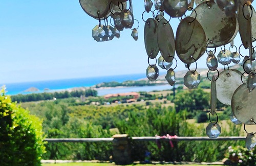 Chia Villa | Spectacular sea view of the entire bay of Su Giudeu. King size bed +topper