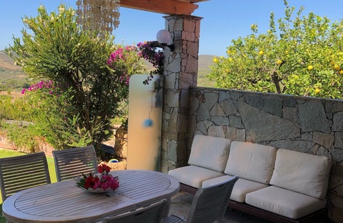 Chia Villa | Spectacular sea view of the entire bay of Su Giudeu. King size bed +topper