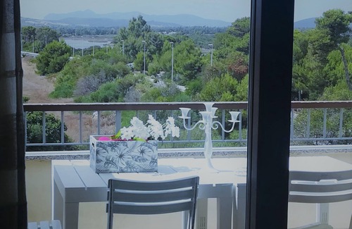 Alghero Apartment | Spectacular Seaview: Apartment Sunshine Only a Few Meters From the Beach of Maria Pia