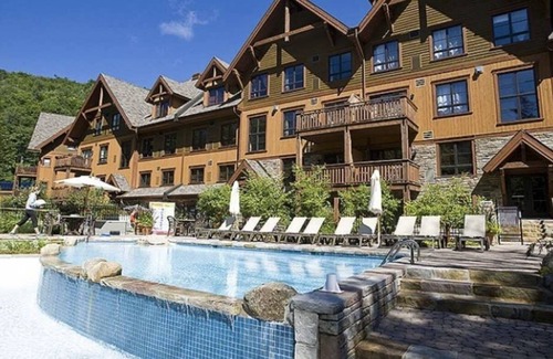 Versant Soleil Ski Chalet | SPECTACULAR SKI IN - SKI OUT Golf Hiking Biking Casino Chalet in Mont Tremblant