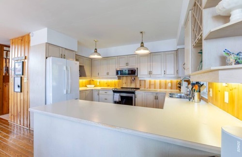 Gravenhurst Cottage | Spectacular View of Lake Muskoka with Guest Cottage above Boathouse