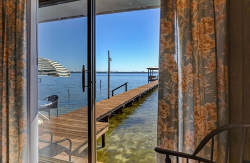 Starke House | Spectacular Views On A Pristine Lake, Home sits at the waters edge for best view