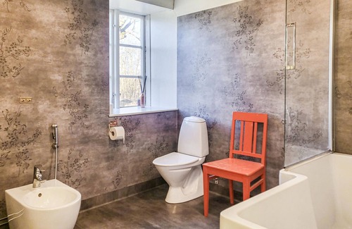 Stanga House | Spend a relaxing vacation in this inviting cottage on the edge of the forest.