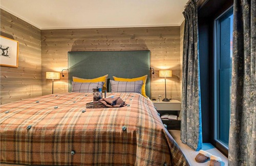 Lillehammer Apartment | Spend a wonderful vacation in this comfortable vacation home with mountain view and sauna.