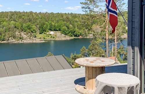 Kragero House | Spend an idyllic island vacation in this enchanting vacation home by the fjord.