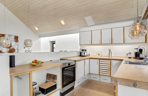 Kjellerup House | Spend an unforgettable vacation in this inviting vacation home with wellness.