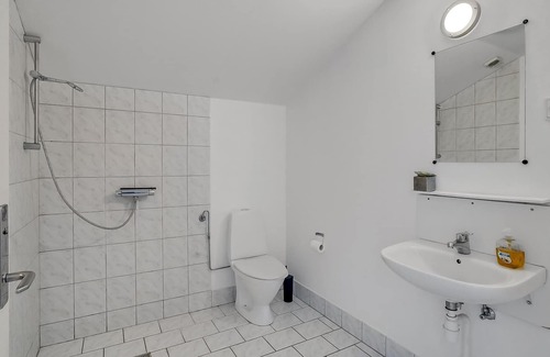 Emmerlev Apartment | Spend an unforgettable vacation in this spacious apartment by the sea.