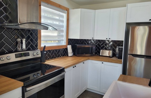 Mauricie Ski Chalet | Splendid Chalet on the banks of the Mékinac & SPA & Foyer