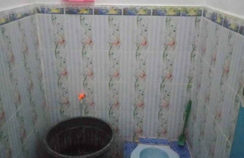 West Pesisir Hotel | SPOT ON 91371 Wisma Nadira Near SPBU PT. Trijaya Pugung PENENGAHAN