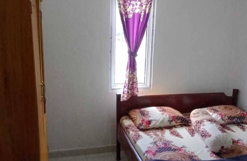 West Pesisir Hotel | SPOT ON 91371 Wisma Nadira Near SPBU PT. Trijaya Pugung PENENGAHAN