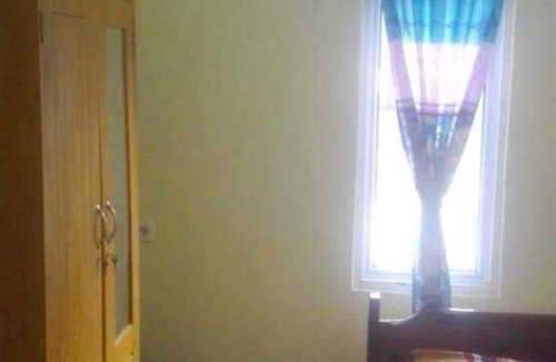 West Pesisir Hotel | SPOT ON 91371 Wisma Nadira Near SPBU PT. Trijaya Pugung PENENGAHAN