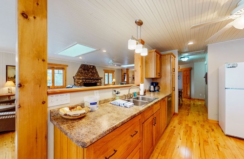St Germain House | Sprawling lakeside home with dock, kayaks, pool table, fireplace, grill, & AC