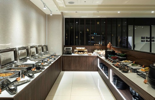West District Hotel | Spring's Rhapsody Hotel