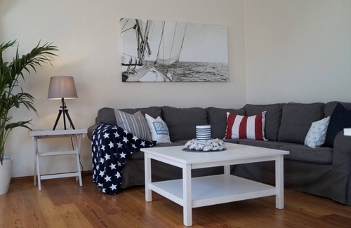 Westermarkelsdorf Apartment | Stylish Baltic Sea apartment with island flair and a lovely fenced garden