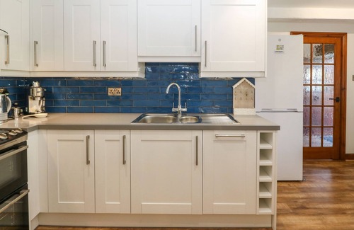 Llwyndyrys Cottage | STABLE COTTAGE, family friendly, with hot tub in Pwllheli