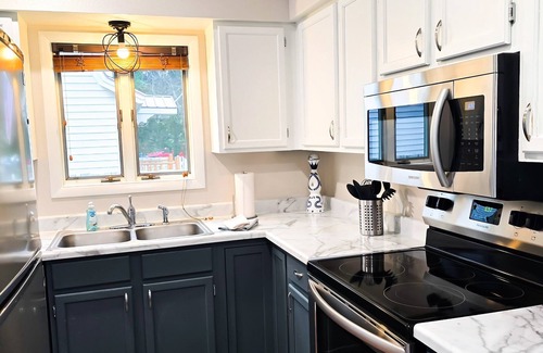 Cody House | Stampede Place- New listing! Dog friendly home close to grocery stores and library