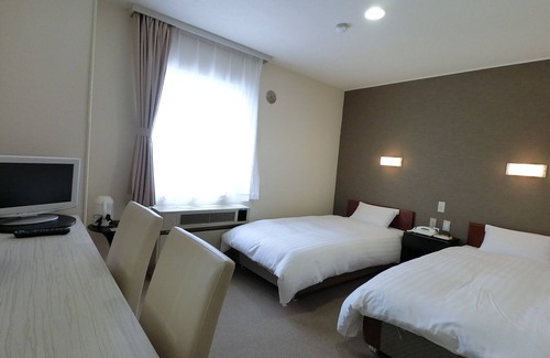 Ishiwaki House | Standard Twin room No mealsNonsmoking River view /Yurihonjo Akita