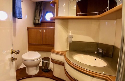 Bodrum City Center Boat Rental | Stay at a luxury crewed 2011 Azimut 55 Fly yacht in Bodrum 3 cabins for 6 guests