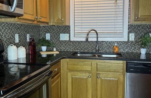 Terry Sanford House | Stay in a cozy downtown cottage within 5 mi of I-95, Hwy 301 & NC Hwy 87!