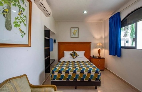 Centro Hotel | Stay in the Heart of Mérida with King Room, Pool, Patio & Terrace Views
