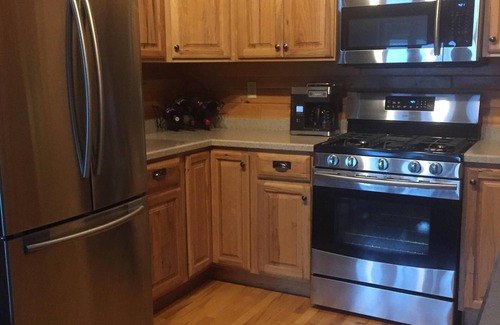 Mohawk House | Stay in Wonderful Cabin on Lac La Belle, Ski Mt. Bohemia, Snowmobile