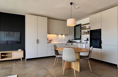 Mellieħa Heights Apartment | Step inside to discover a modern and elegantly decorated space, featuring two spacious bedrooms with ample storage, ensuring a restful and convenient stay. The open-plan living area boasts contemporary furnishings, providing a chic and cozy atmospher
