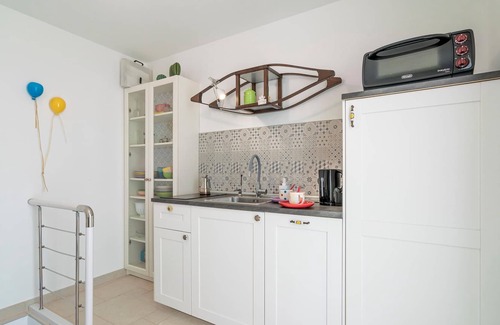 Polignano a Mare House | Step into a renovated vacation home built in 1800, located in a small coastal town 150 m from the ro