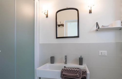Polignano a Mare House | Step into a renovated vacation home built in 1800, located in a small coastal town 150 m from the ro