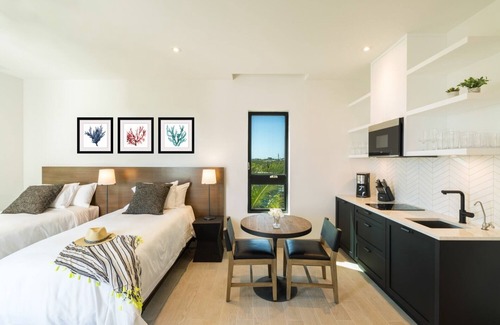 Long Bay Hills Resort | Step out onto your private terrace for amazing garden views!