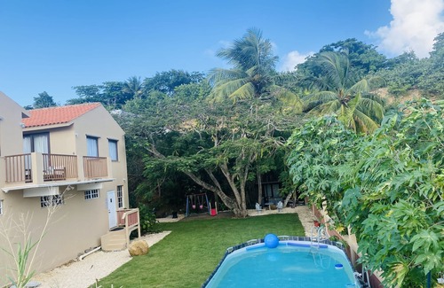 Espinosa Cottage | Step to the 🏖 private pool and game room 🎱a really spacious and unique house.