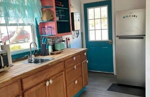 Bath Cabin | Steps from the water with a private dock, a big relaxing porch & great amenities
