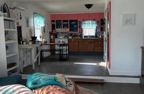 Bath Cabin | Steps from the water with a private dock, a big relaxing porch & great amenities