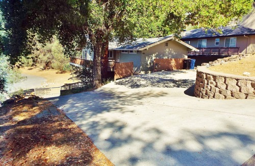 Oak Shores House | Steps to the Marina and community pool, Wifi, and Private Slip!